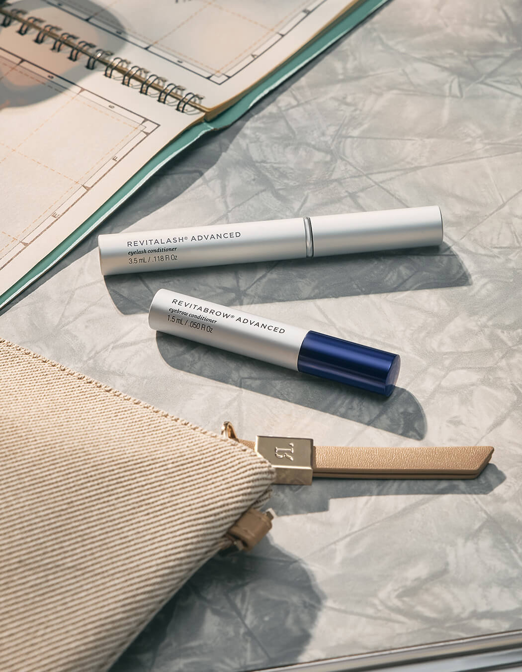 RevitaLash Advanced and RevitaBrow Advanced serums with travel bag